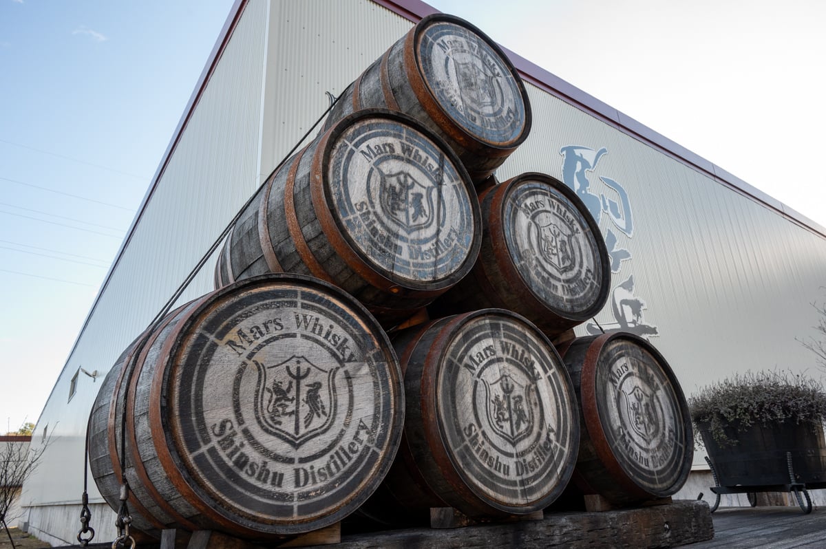 Whisky barrels outside of Mars Komagatake Distillery